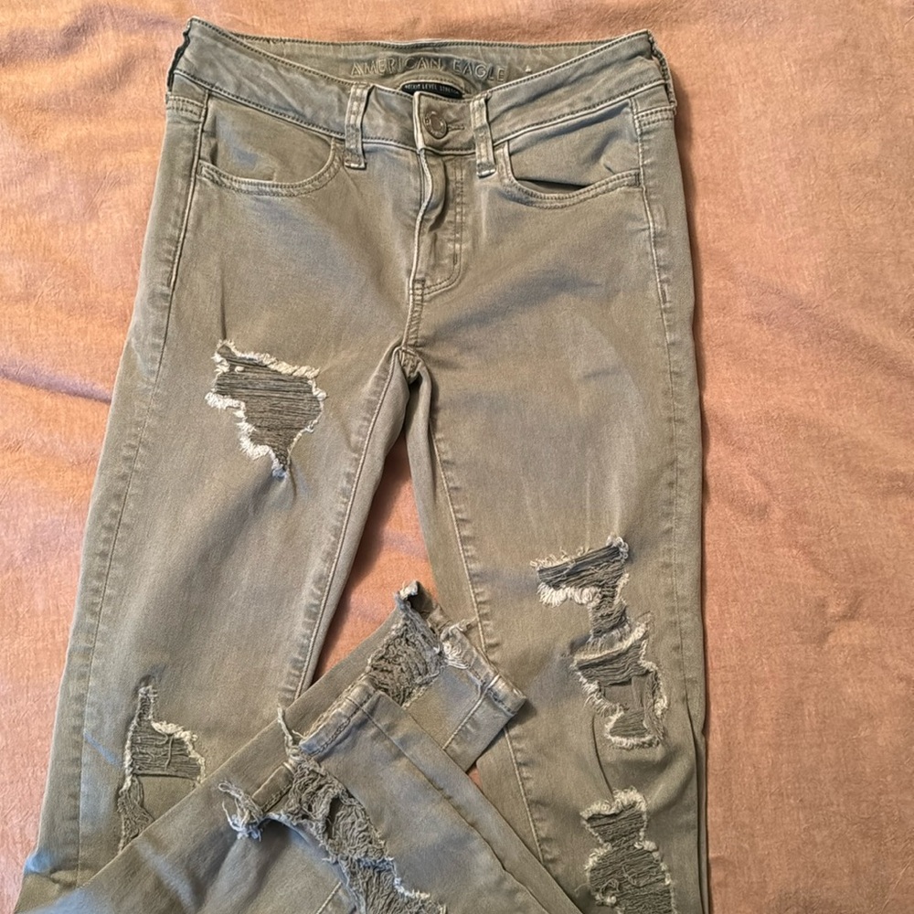American Eagle Jeggings. Looks gray, but they are like a sage green color.